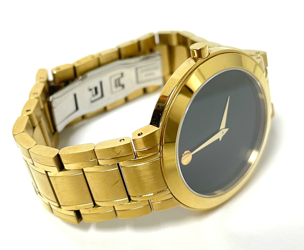 Movado stiri gold top